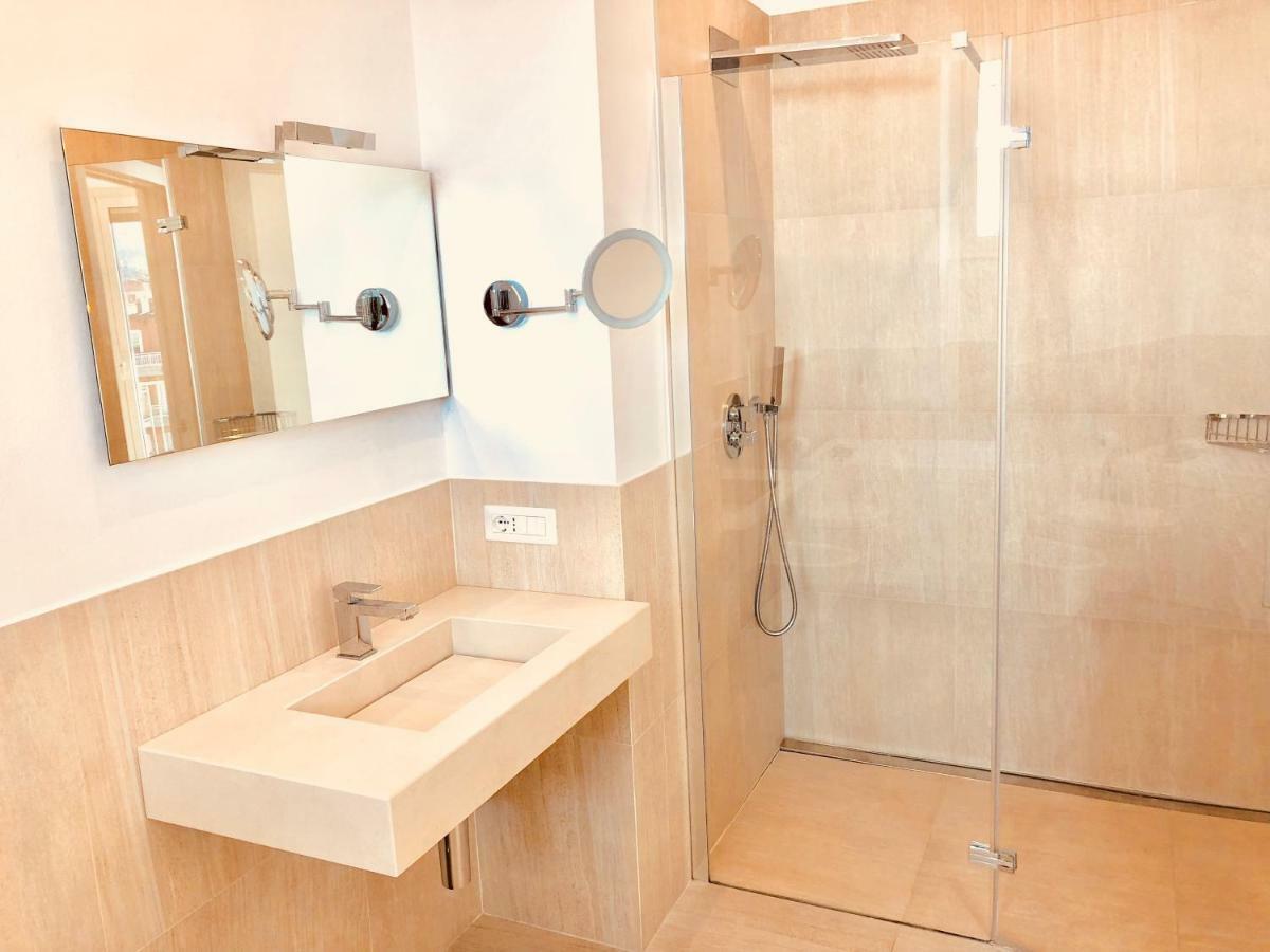 Attico Palazzo Di Vetro Apartment ลุยโน ภายนอก รูปภาพ